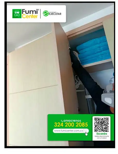 Fumigación profesional en Santa Marta: técnico de FumiCenter con equipo de protección aplicando insecticida (foto 24)